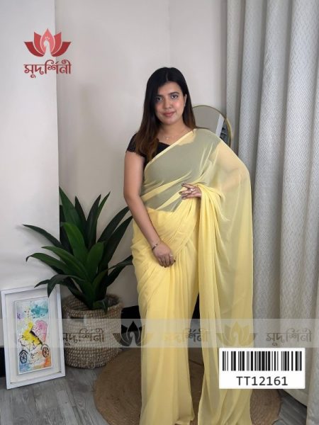 A woman in a yellow dress.